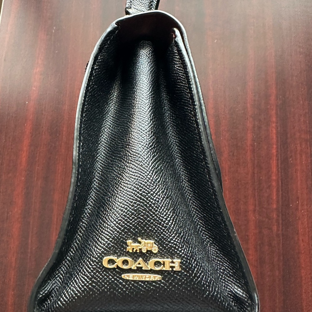 Coach Black Leather Hand or Crossbody style Coach Bag Chic and Trendy